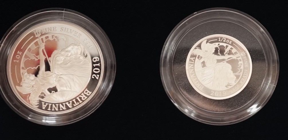 A group of assorted boxed Royal Mint silver proof collector's coins